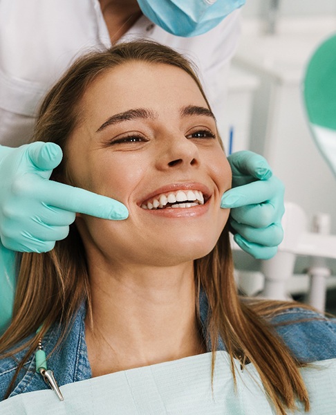 Woman smiling in the dental chair