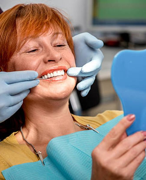 Woman in dentist’s chair for consultation